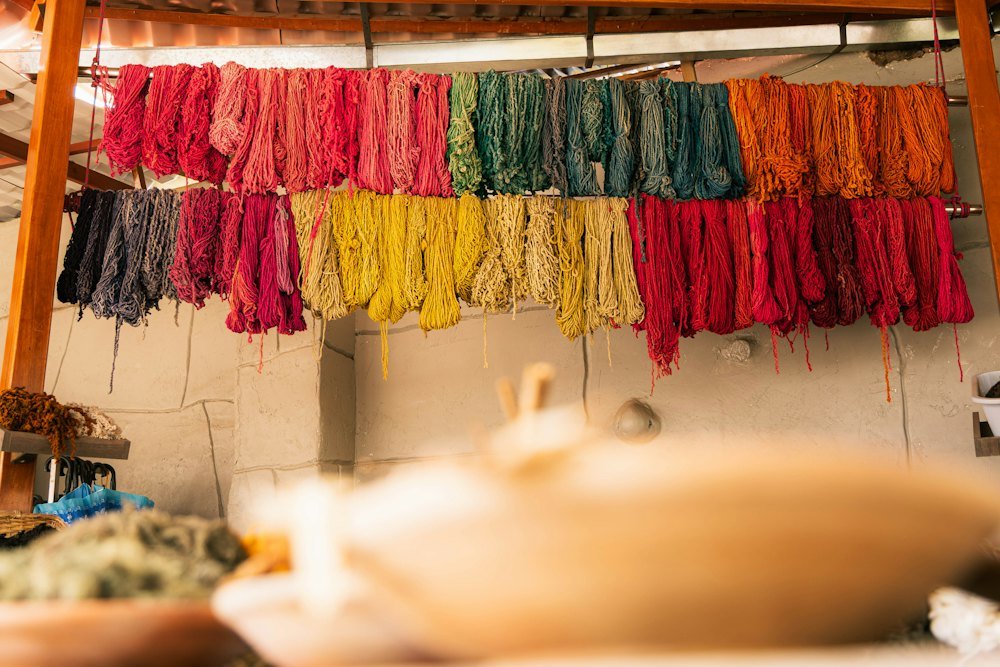Dyed yarns drying on racks